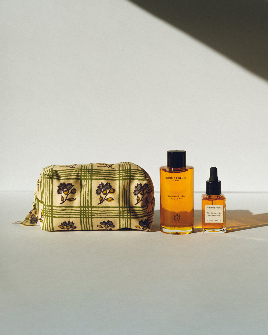 THE FACIAL OIL + TONING BODY OIL + CASEY HILL STUDIO X THOMAS GROVE SKIN MIMI CHINTZ COSMETIC BAG BUNDLE